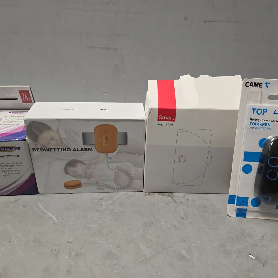 APPROXIMATELY 12 ASSORTED ITEMS TO INCLUDE - CAME REMOTE , BED WETTING ALARM ETC