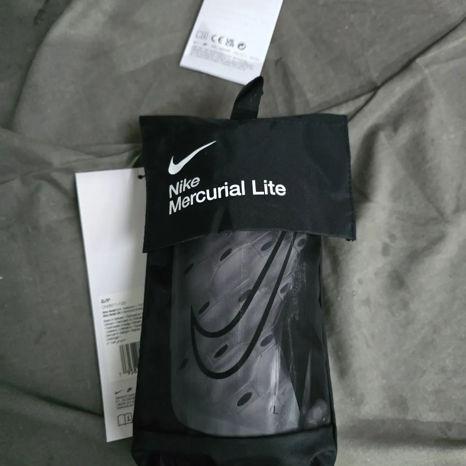 NIKE MERCURIAL LITE SHIN GUARDS – WHITE, WITH SLEEVE & STORAGE BAG