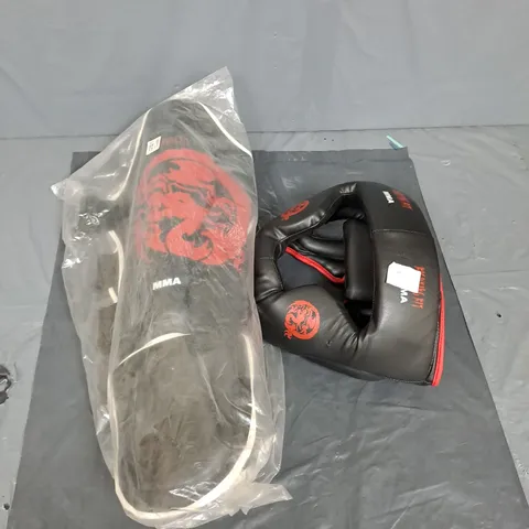 LARGE BOX OF ASSORTED MMA ITEMS TO INCLUDE HEAD GUARDS AND SHIN GUARDS