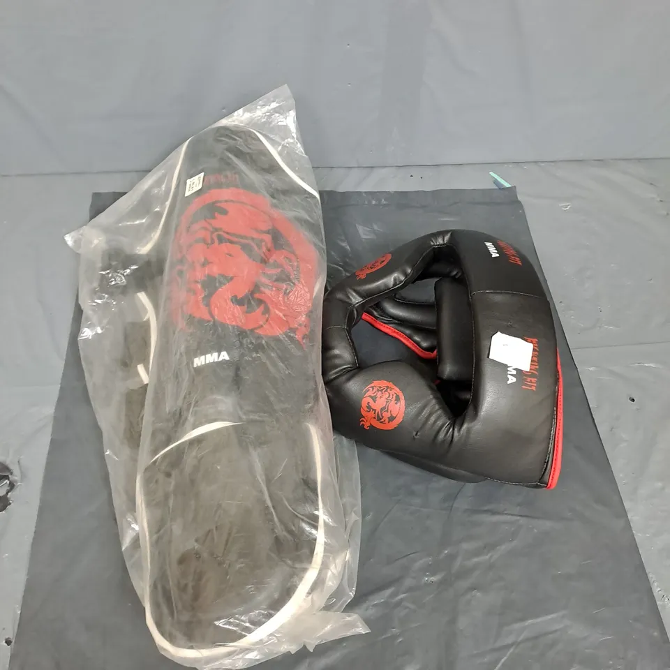 LARGE BOX OF ASSORTED MMA ITEMS TO INCLUDE HEAD GUARDS AND SHIN GUARDS