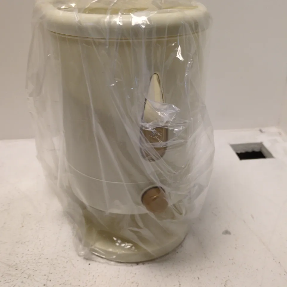 CREAM DISPENSER– WRAPPED IN PROTECTIVE PLASTIC