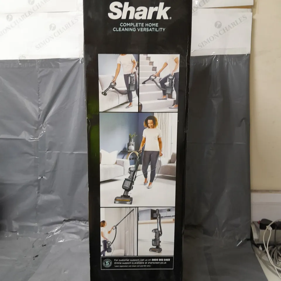 BOXED SHARK UPRIGHT CORDED VACUUM WITH ANTI-HAIR WRAP, LIFTAWAY TECHNOLOGY AND COMPLETE SEAL NZ690UK RRP £249