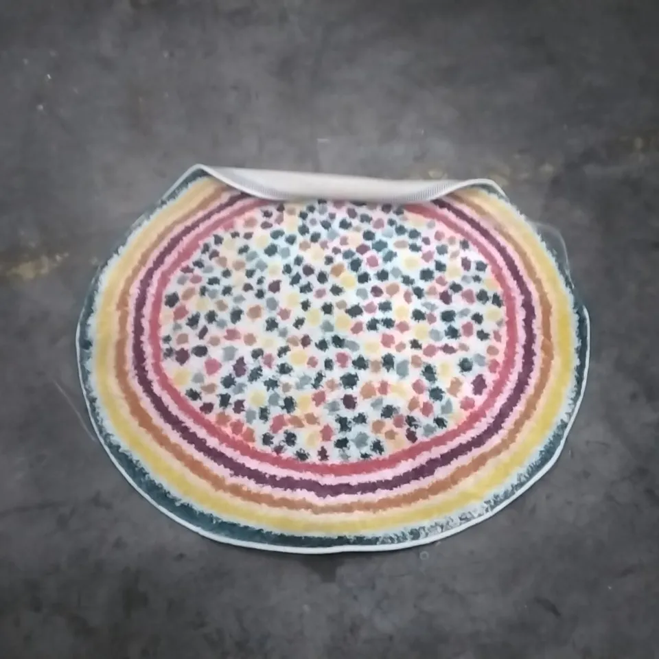 STILLAGE OF APPROXIMATELY 40 DESIGNER RUGS