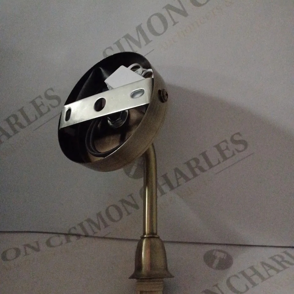 HUXLEY WALL LIGHT ANTIGUED BRASS FINISH