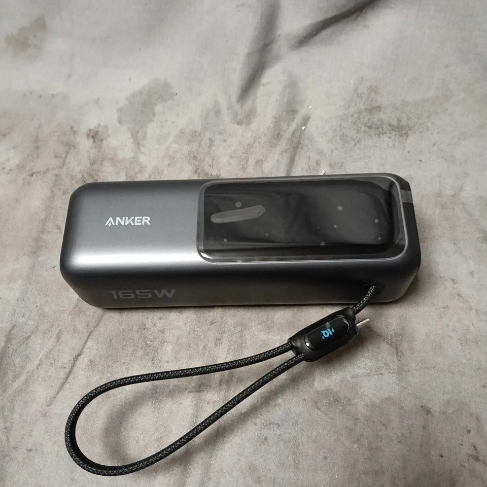 ANKER 165W CHARGER WITH BRAIDED LANYARD, LAPTOP POWER BANK IN CARRY CASE.
