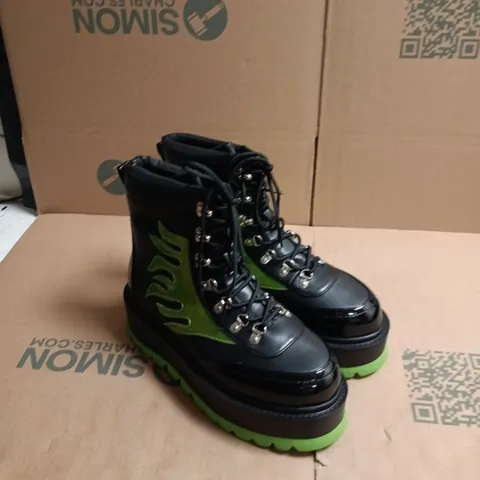 KOI CHA CHA CHA HOLOGRAM FLAME BOOTS – UK 10, BLACK WITH GREEN OUTSOLE