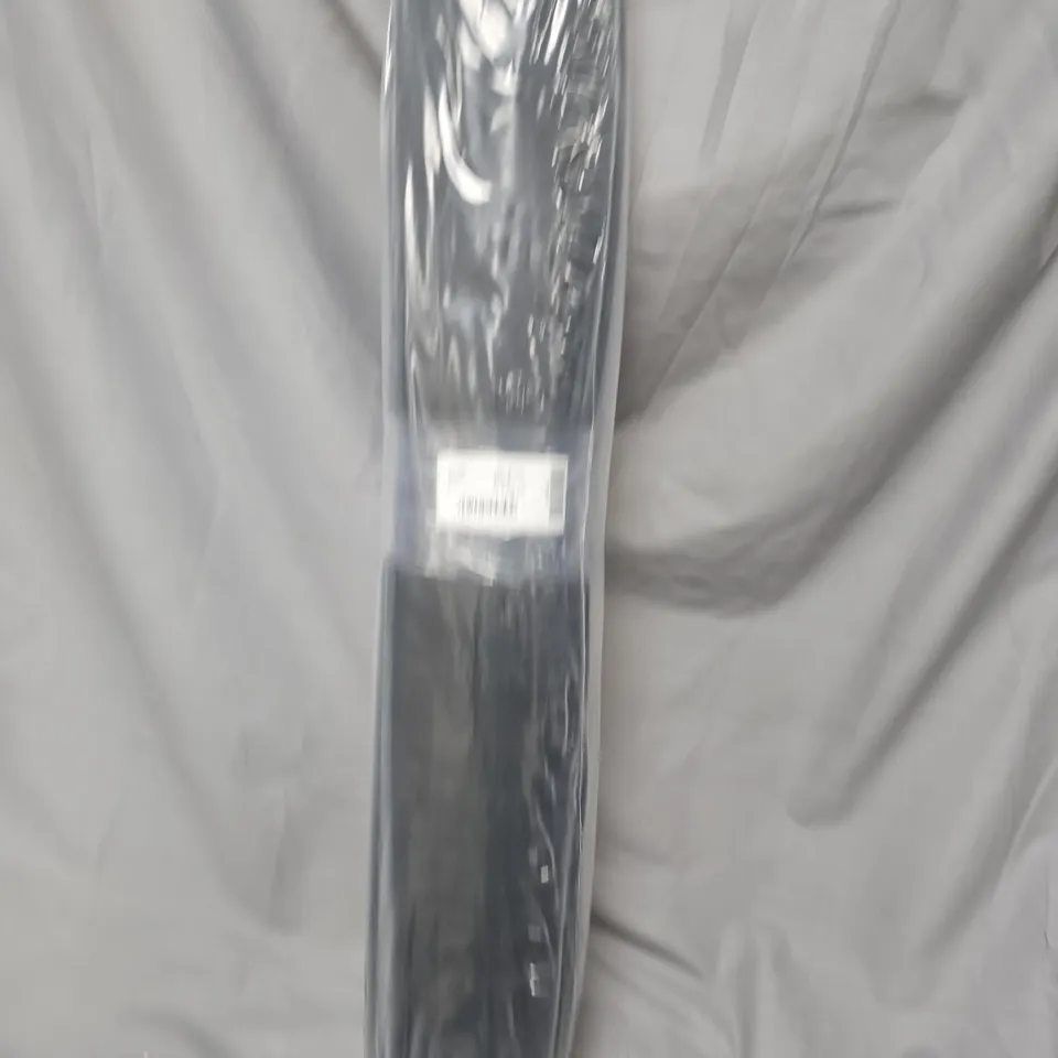 SEALED BLACK FUZZY RUG