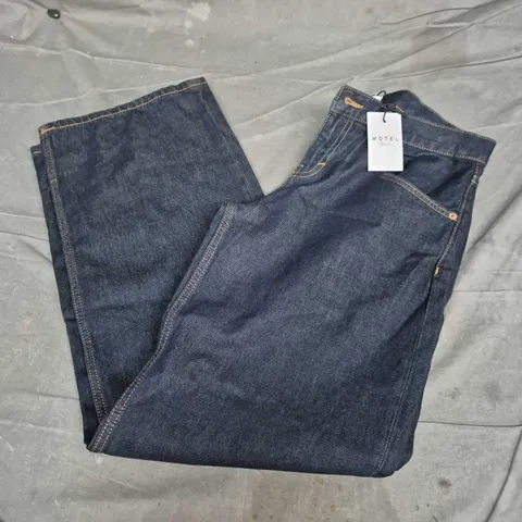 MOTEL LOW RISE PARALLEL INDIGO JEANS IN BLUE - W30/L32