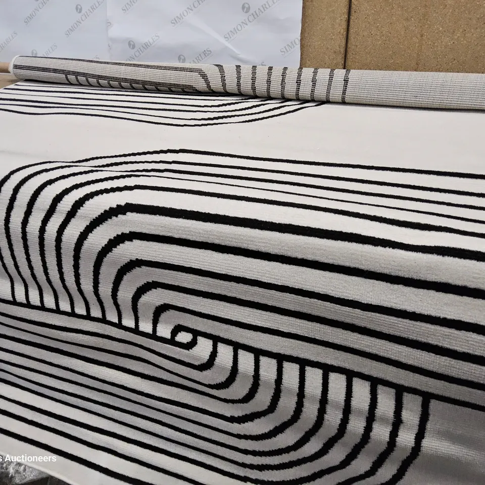 HAID ABSTRACT MACHINE WOVEN AREA RUG 5' × 7'