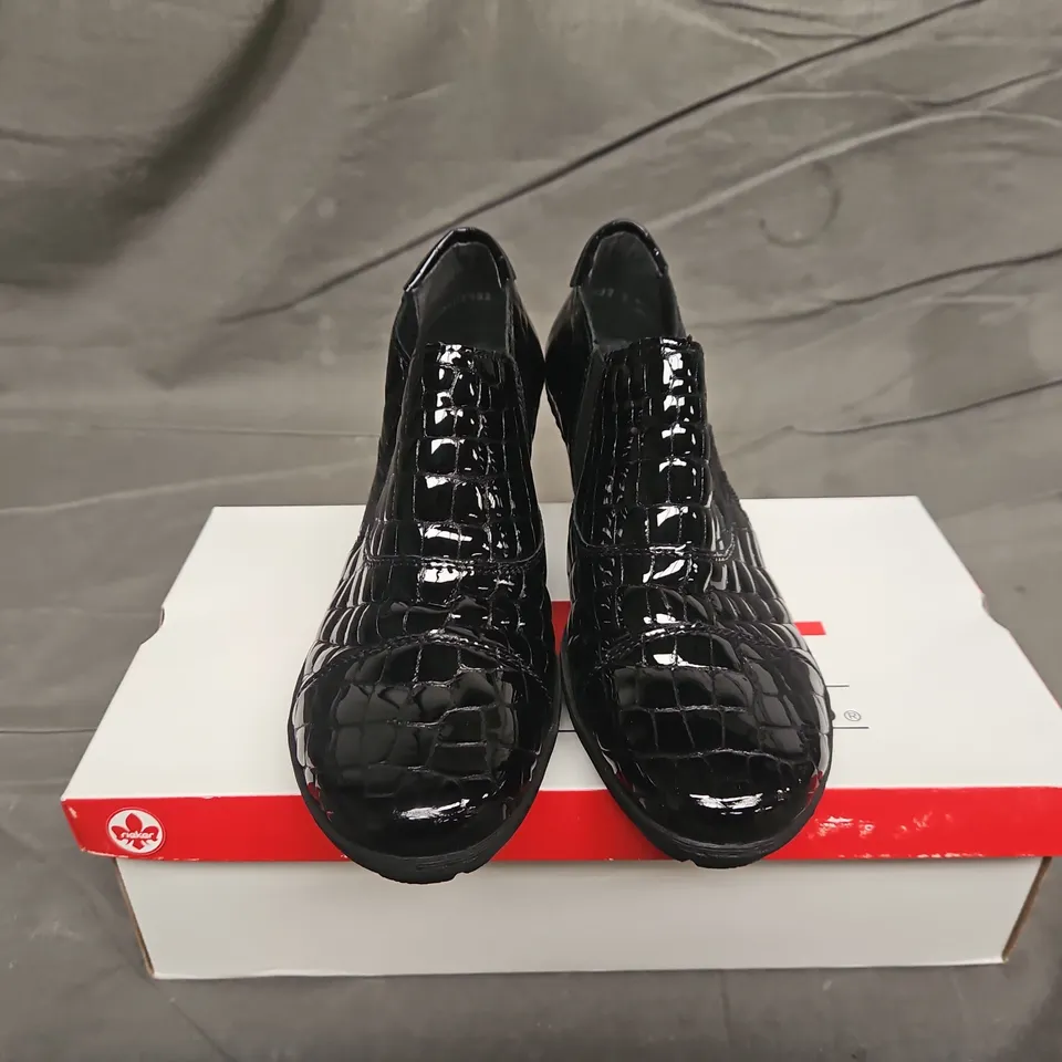 BOXED PAIR OF WOMENS RIEKER SCHWARS BLACK SIDE ZIP BOOTS - UK SIZE 39