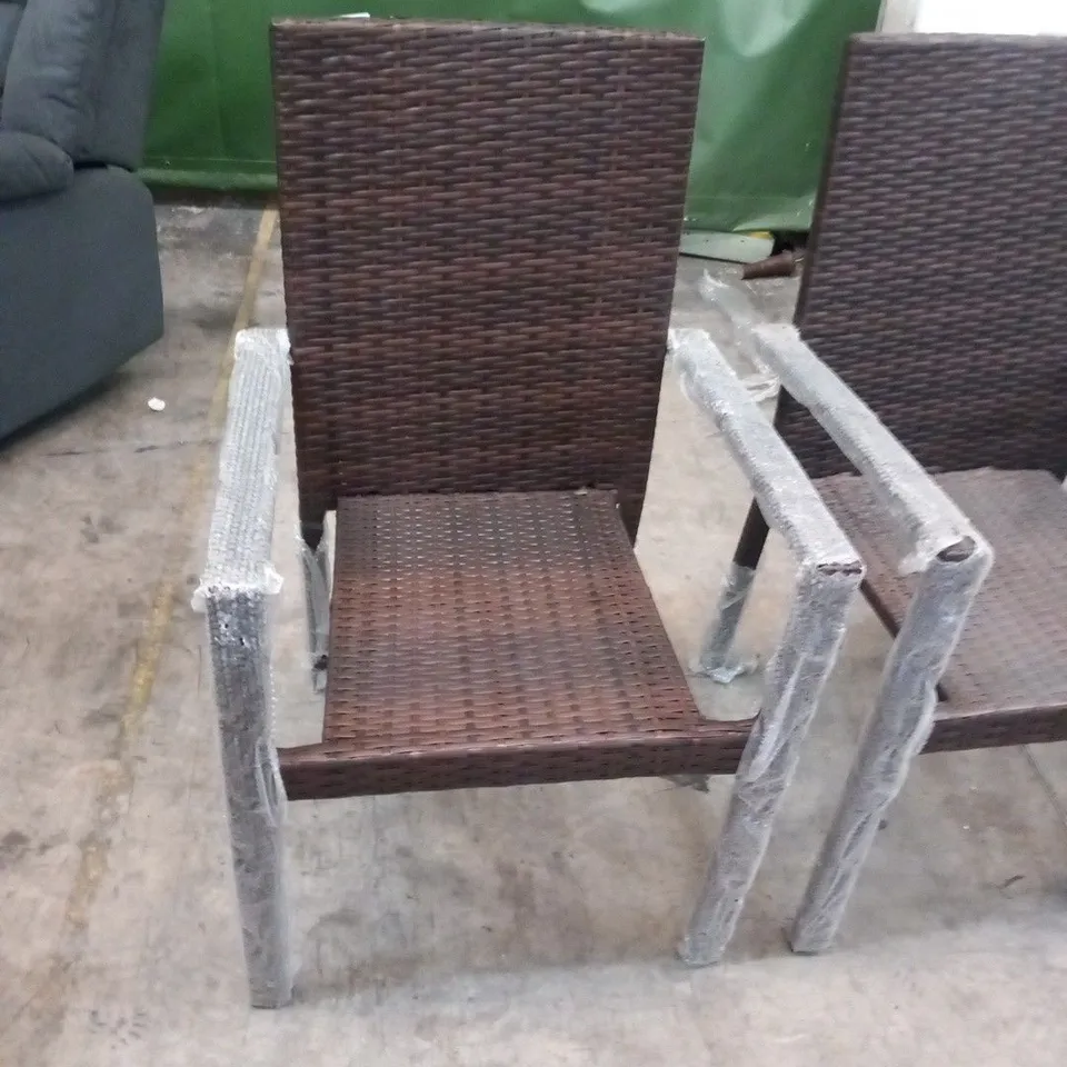 FOUR RATTAN EFFECT GARDEN ARMCHAIRS