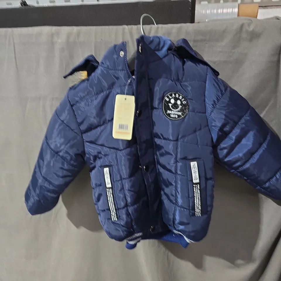 BOX OF APPROXIMATELY 25 KIDS CLOTHING ITEMS INCLUDING:WHITE FUR COAT WITH STARS, BLUE PUFFER AND PINK RAINCOAT