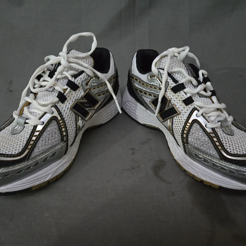 BOXED PAIR OF NEW BALANCE 1906R SHOES IN WHITE/SILVER/GOLD UK SIZE 6.5