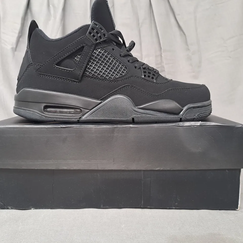 BOXED PAIR OF NIKE AIR JORDAN 4 RETRO SHOES IN BLACK UK SIZE 9