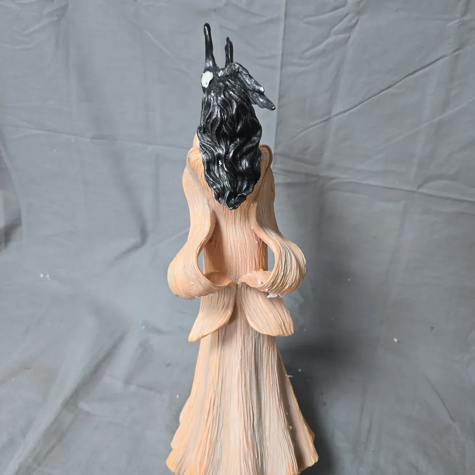 FIGURINE: WOMAN IN PEACH DRESS DECORATIVE SCULPTURE-DAMAGE TO WING 
