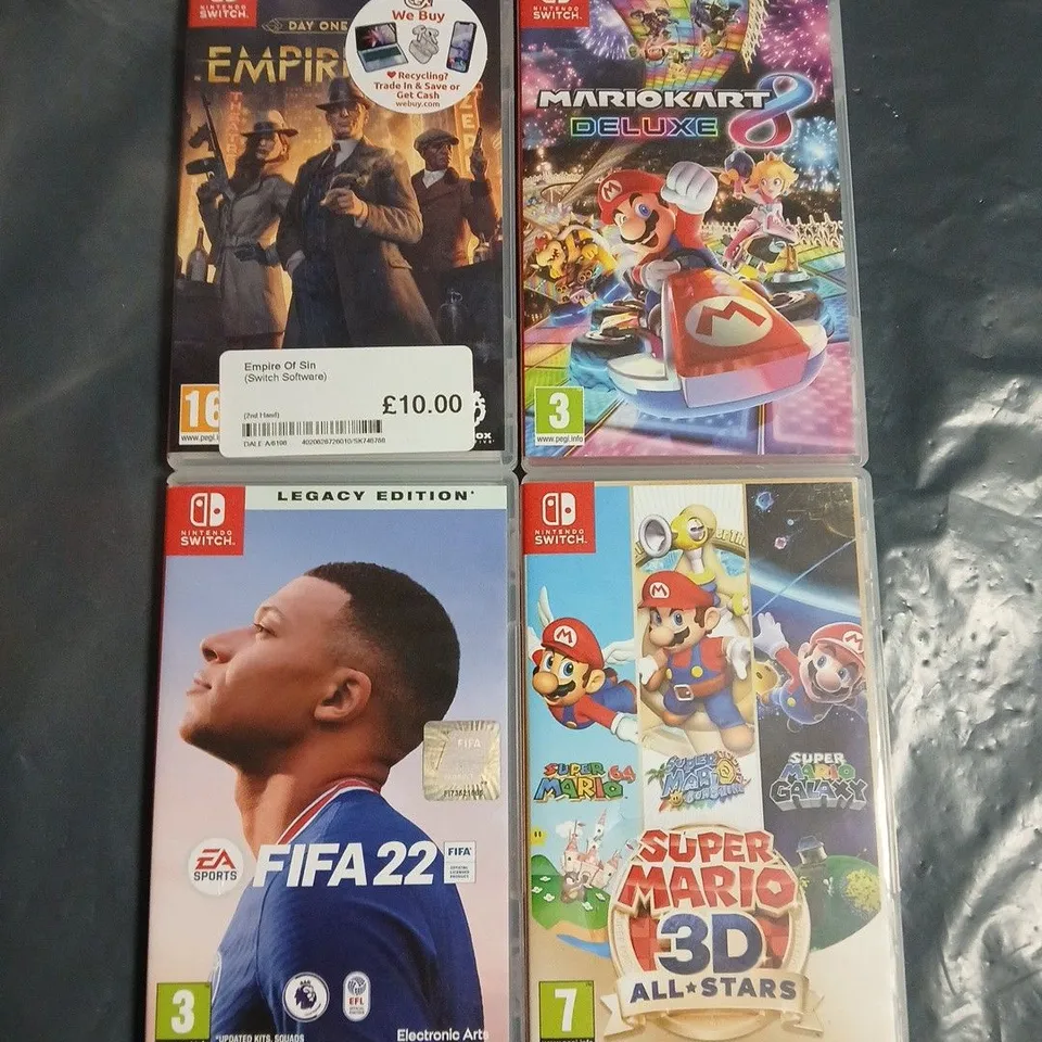 LOT OF 4 ASSORTED NINTENDO SWITCH GAMES TOP INCLUDE MARIO KART AND FIFA