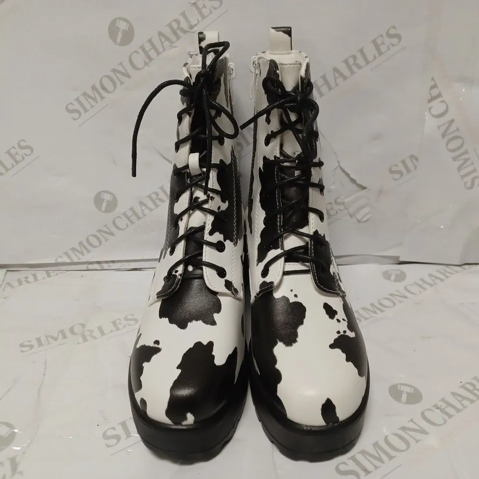 PAIR OF KOI DESIGNER VEGAN COW PRINT PLATFROM HEELED ANKLE BOOTS - SIZE 6