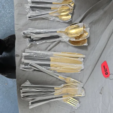 GOLD-TONE CUTLERY SET WITH SPOONS & FORKS, SEALED IN PLASTIC SLEEVES