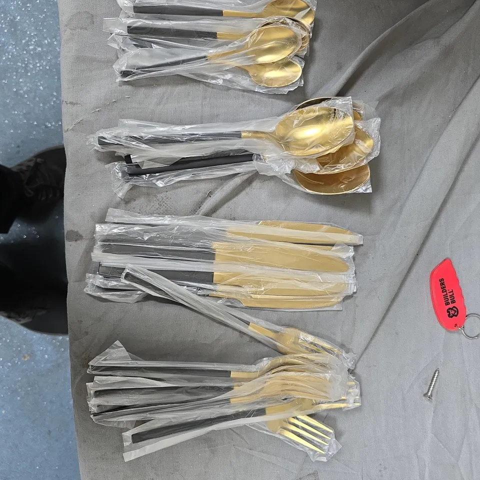 GOLD-TONE CUTLERY SET WITH SPOONS & FORKS, SEALED IN PLASTIC SLEEVES