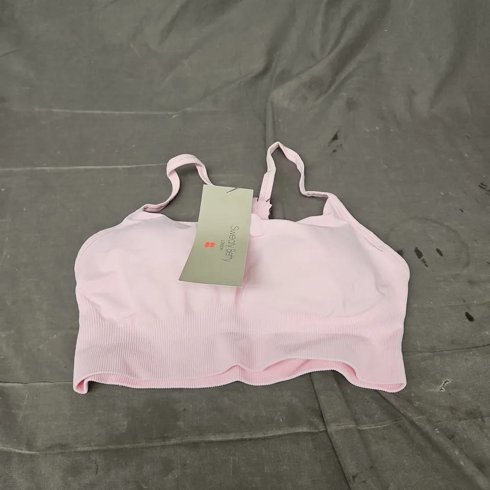 SWEATY BETTY SPIRIT RESTORED SEAMLESS YOGA BRA IN NERINE PINK SIZE M