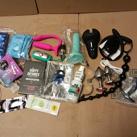 LOT OF ASSORTED ADULT PLEASURE ITEMS TO INCLUDE CONDOMS AND LUBE, BUTT PLUGS, C*CK RINGS AND VIBRATOR