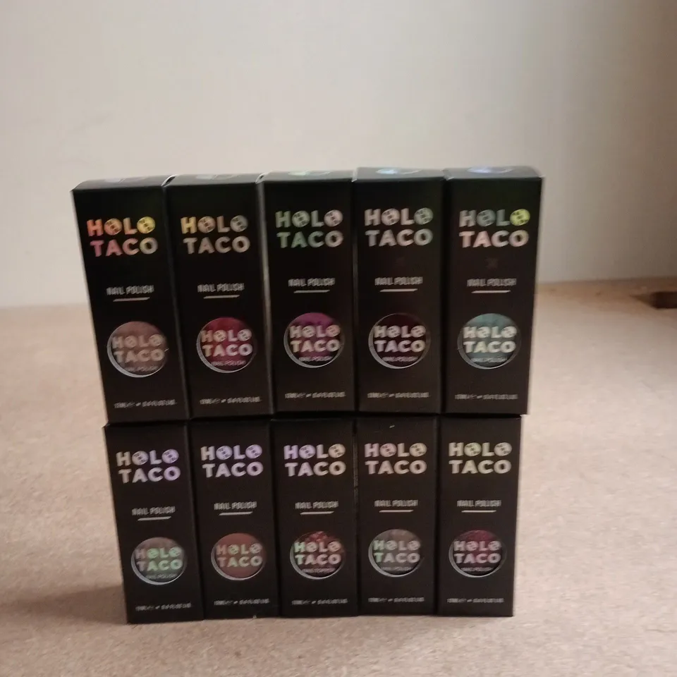 LOT OF APPROXIMATELY 10 HOLO TACO NAIL VARNISH IN ASSORTED COLOURS