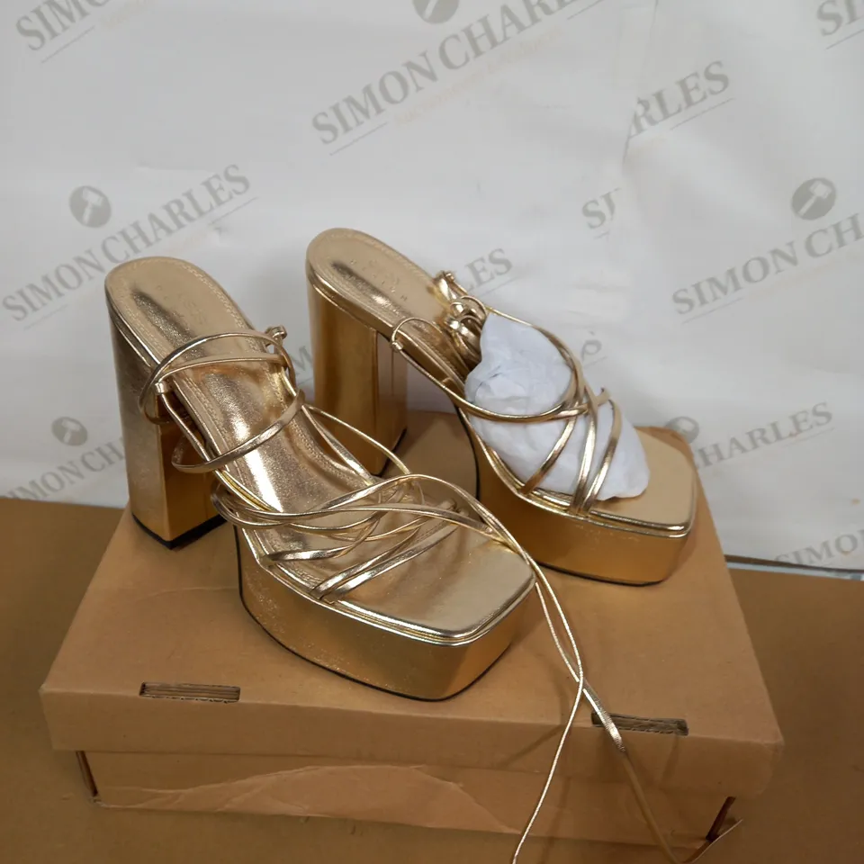 BOXED PAIR OF ASOS GOLD PLATFORM HIGH HEELS SIZE 6