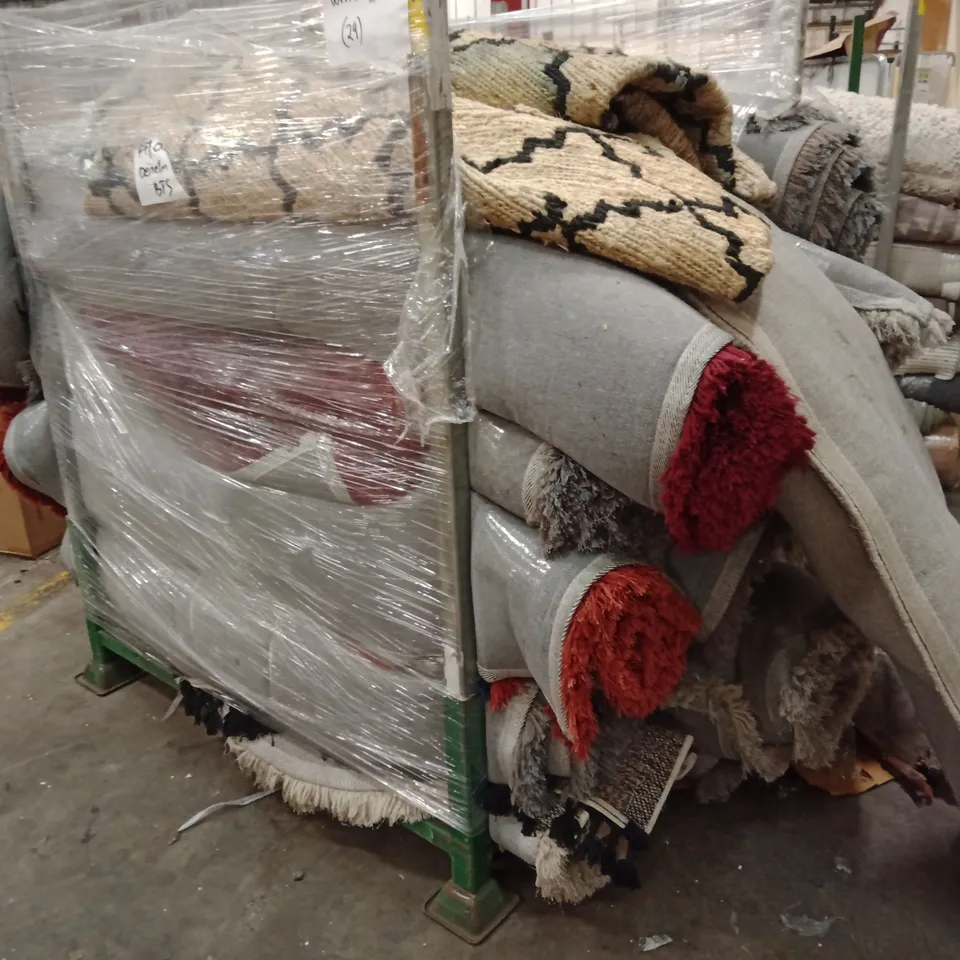 STILLAGE OF APPROXIMATELY 20 DESIGNER RUGS