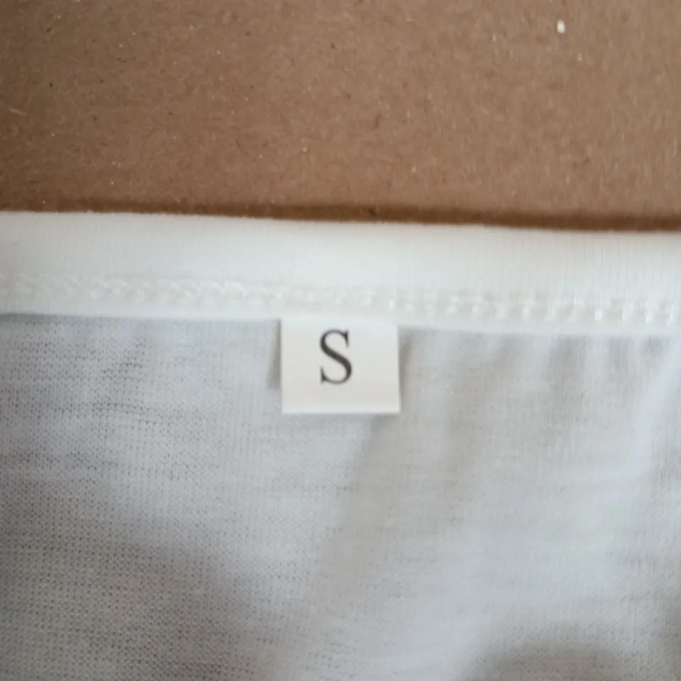 UNBRANDED WHITE WOMENS TOP WITH LACE TRIM.