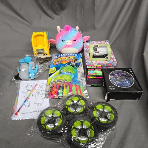 APPROXIMATELY 10 ASSORTED TOYS AND GAMES TO INCLUDE WATER BALLOONS, TOYS AND NICE CUBE