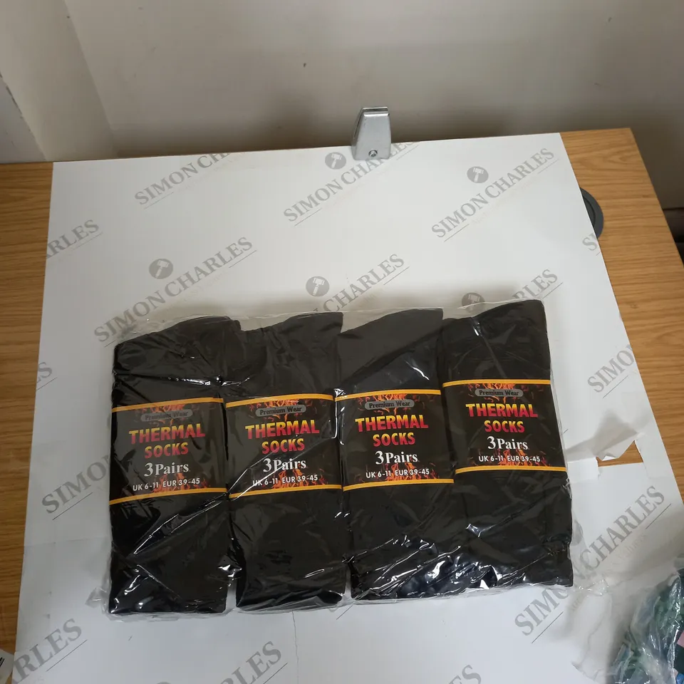 BOX OF ASSORTED CLOTHING ITEMS TO INCLUDE SOCKS, DRESSES, TOPS, PYJAMAS ETC