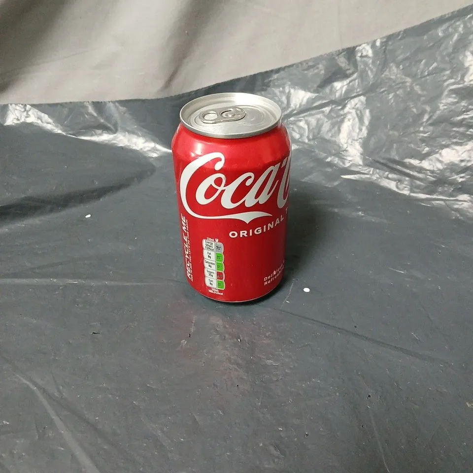 APPROXIMATELY 10 COCA COLA 330ML CANS