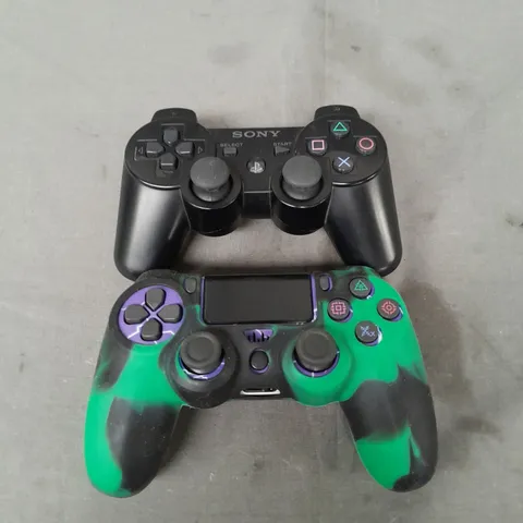SET OF 2 PLAYSTATION CONTROLLERS
