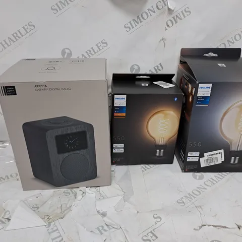 LARGE BOX OF ASSORTED ELECTRICAL ITEMS TOO INCLUDE RADIOS , LIGHT BULBS AND MOTION SENSORS