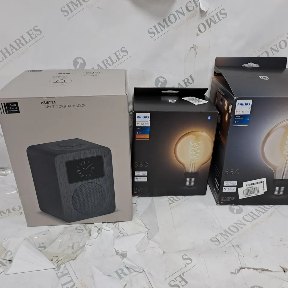 LARGE BOX OF ASSORTED ELECTRICAL ITEMS TOO INCLUDE RADIOS , LIGHT BULBS AND MOTION SENSORS 