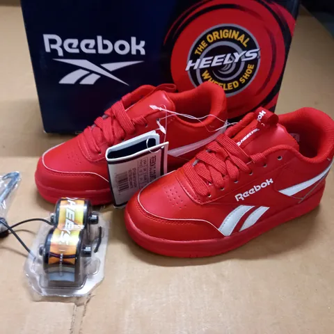 BOXED PAIR OF REEBOK COUT LOW HEELEYS IN RED - UK 12