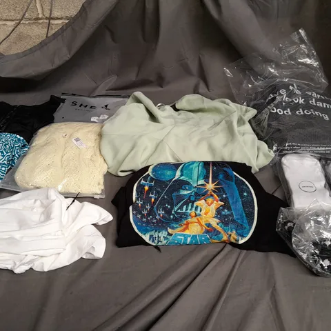 BOX OF APPROXIMATELY 18 ASSORTED ITEMS TO INCLUDE - DRESSES , JUMPERS , AND T-SHIRTS ETC