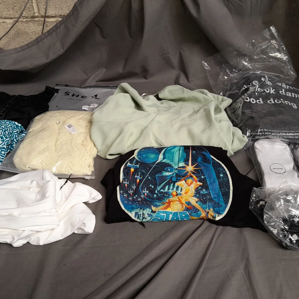 BOX OF APPROXIMATELY 18 ASSORTED ITEMS TO INCLUDE - DRESSES , JUMPERS , AND  T-SHIRTS ETC