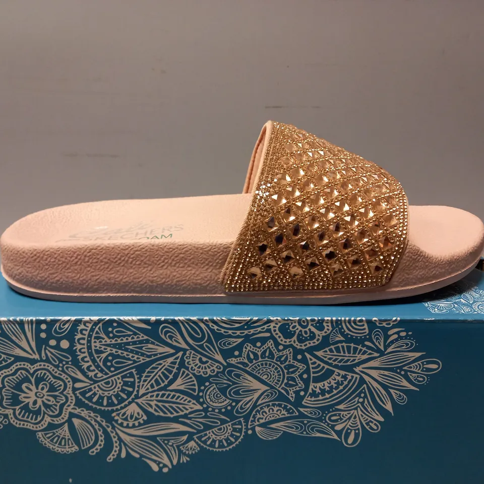 BOXED PAIR OF SKECHERS SANDALS IN ROSE GOLD SIZE 4