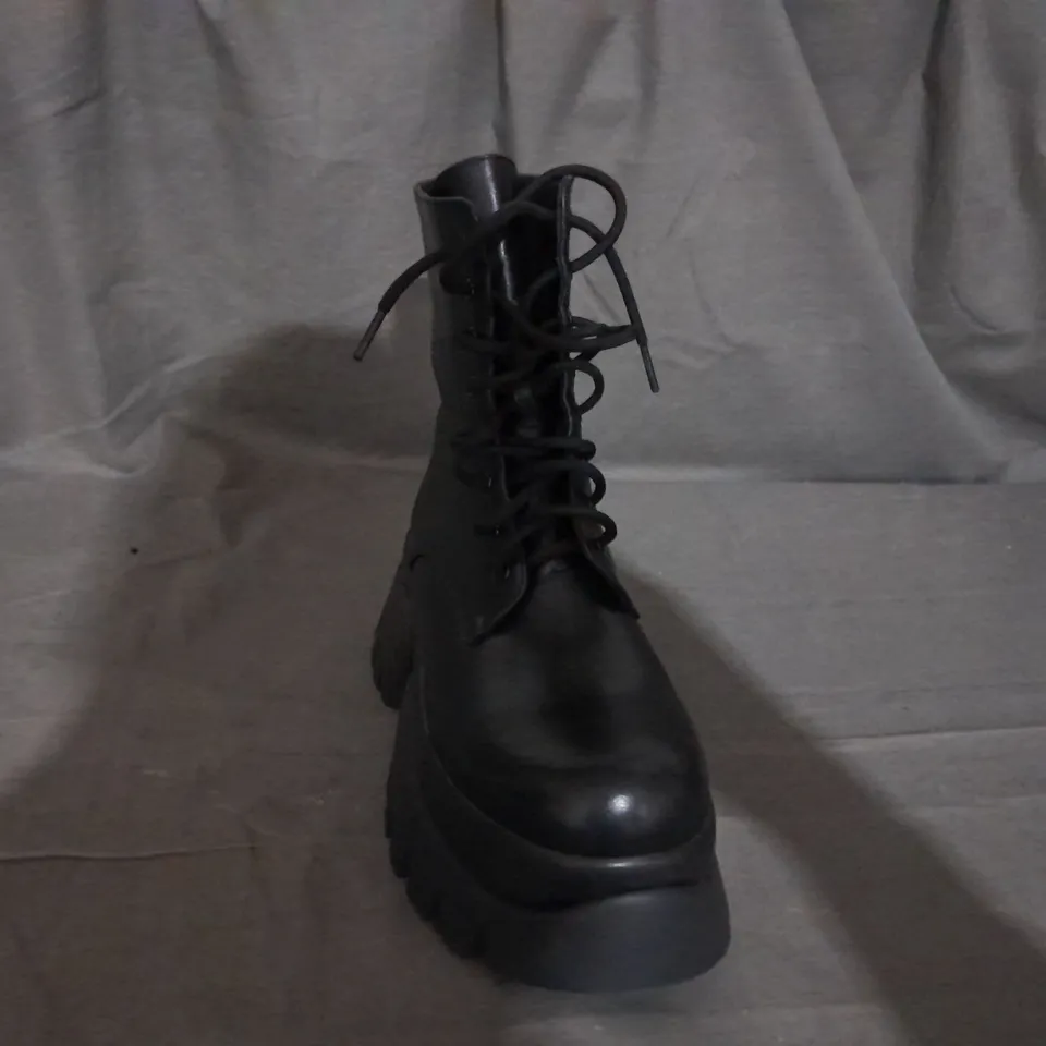 PAIR OF KOI LACE UP BOOTS IN BLACK SIZE 6 