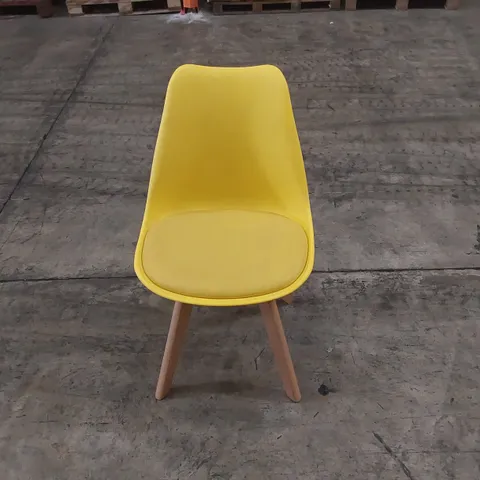 DESIGNER YELLOW PLASTIC DINING CHAIR WITH PADDED SEAT