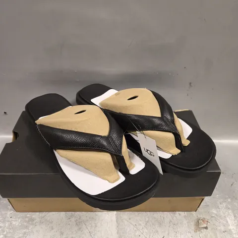 BOXED PAIR OF UGG SEASIDE SHOES IN BLACK 