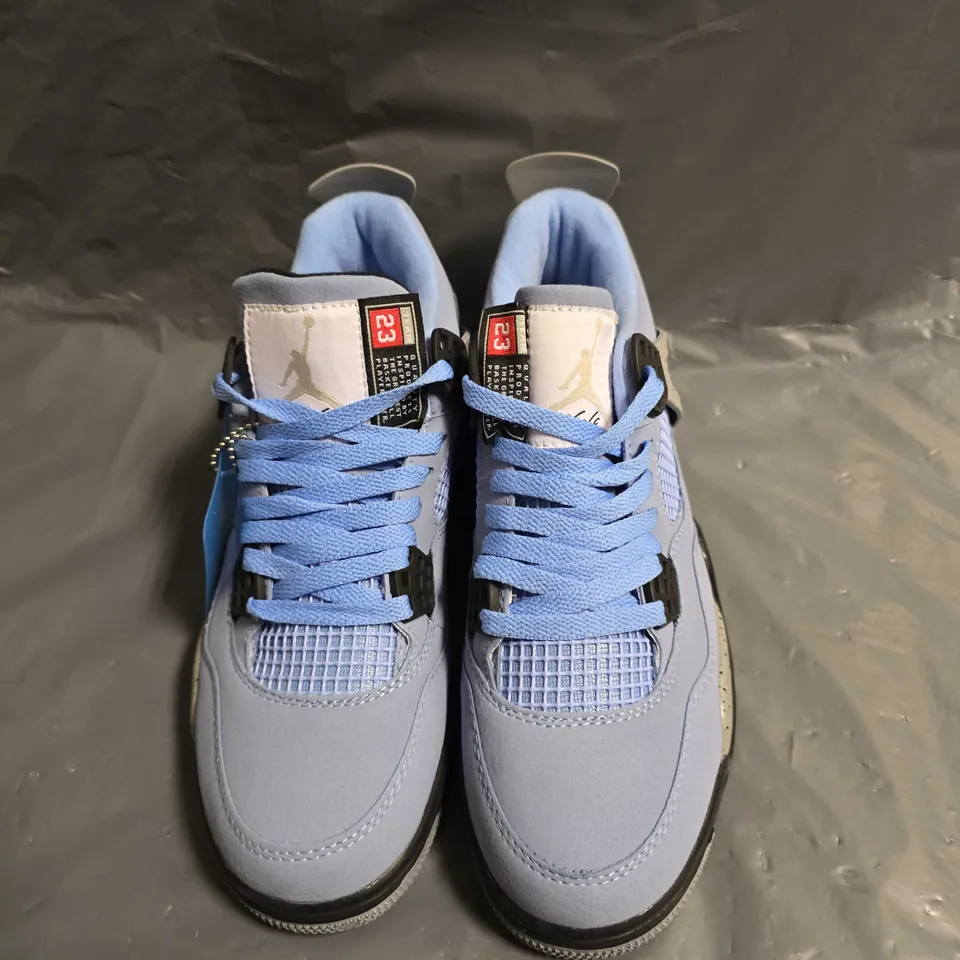 PAIR OF NIKE AIR JORDAN 4 RETRO UNIVERSITY BLUE - UK SIZE 7