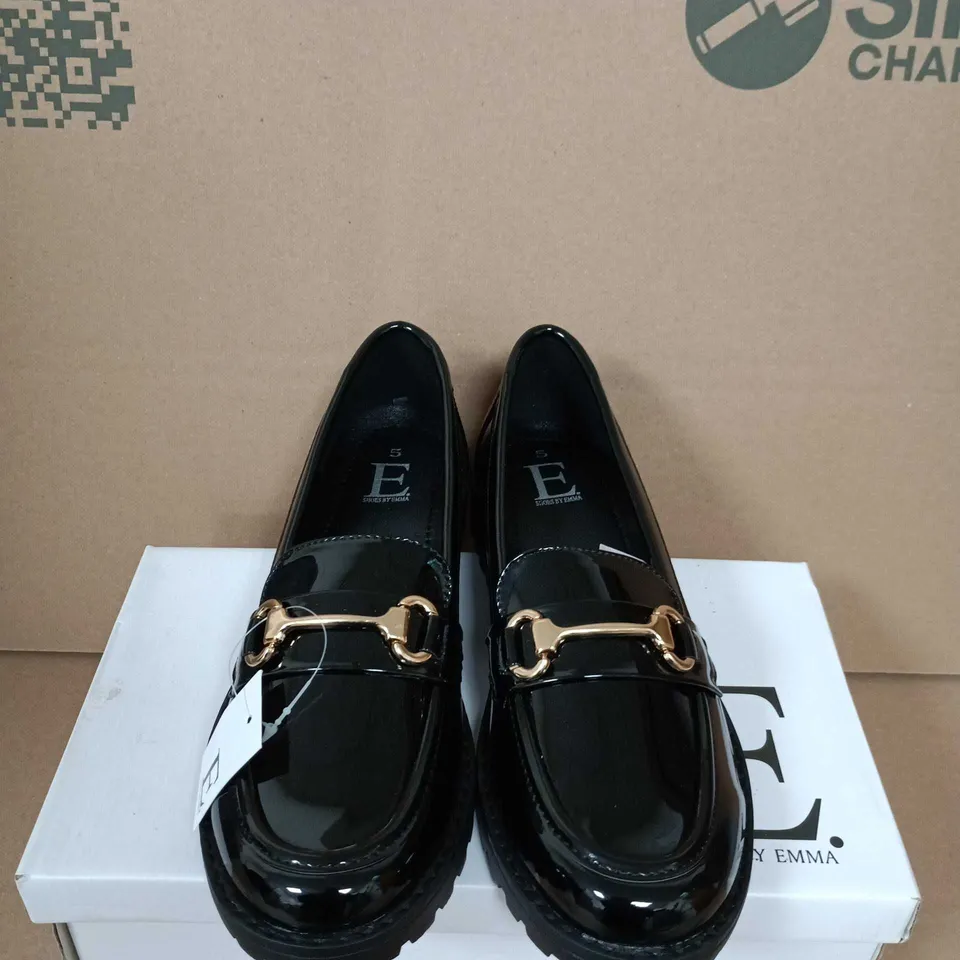BOXED PAIR OF SHOES BY EMMA BLACK PATENT LOAFERS WITH GOLD HORSEBIT BUCKLE – UK SIZE 5