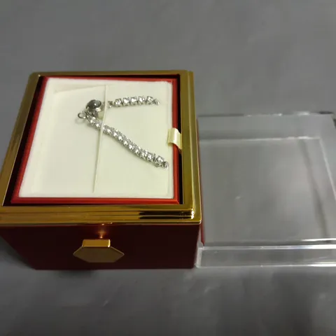 STONE SET BRACELET IN REVOLVING ROSE PRESENTATION BOX