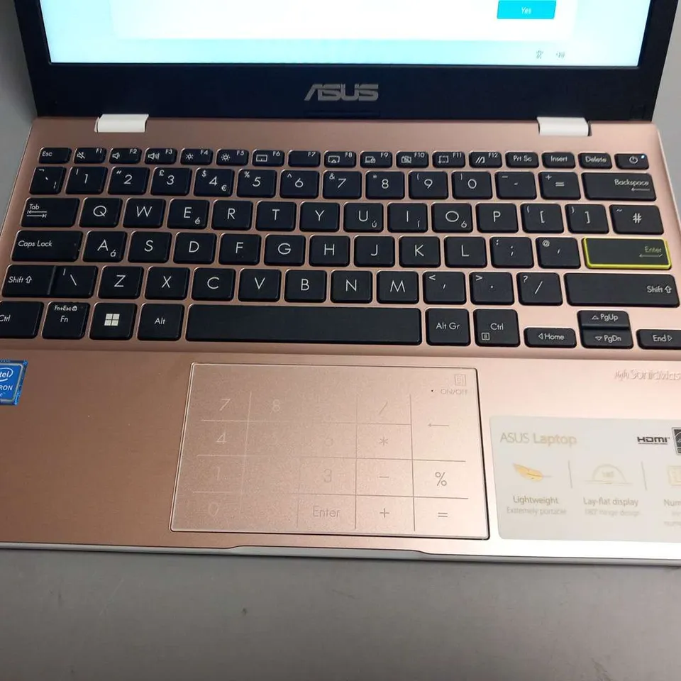 BOXED ASUS SONICMASTER E210M NOTEBOOK WITH CHARGER