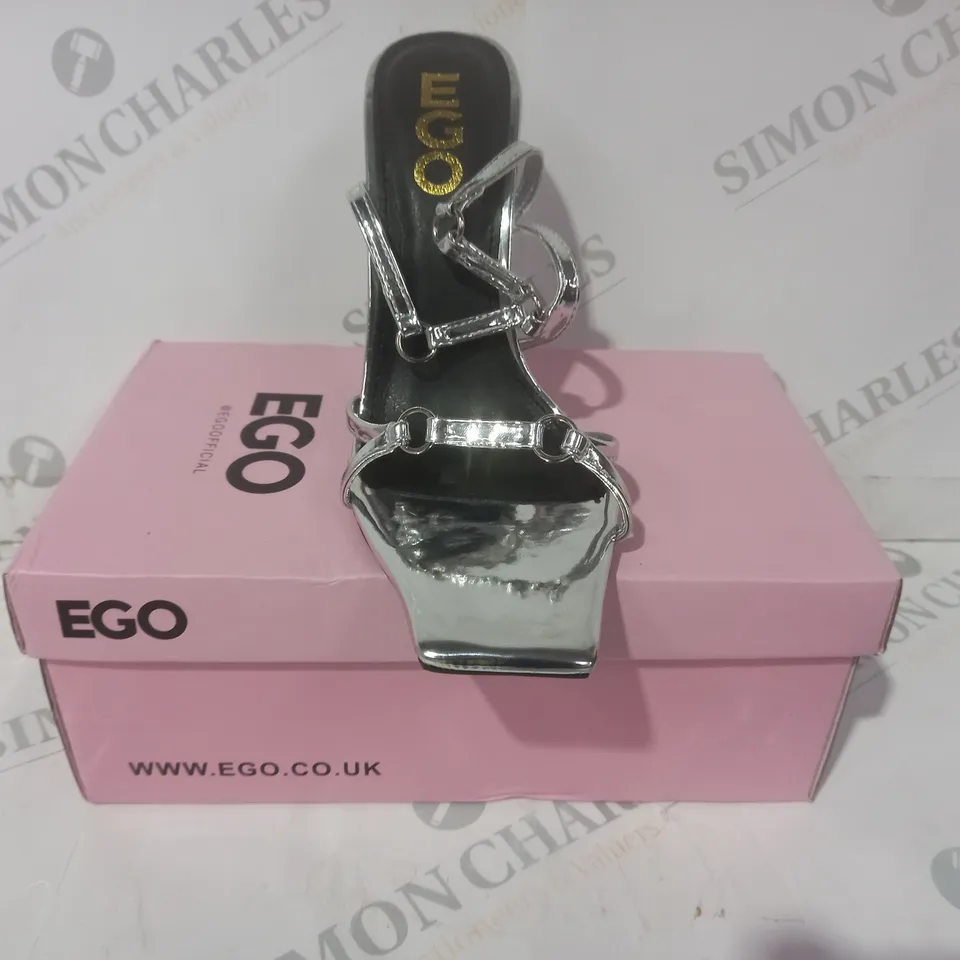 BOXED PAIR OF EGO OPEN TOE HIGH HEELED STRAPPY SANDALS IN METALLIC SILVER UK SIZE 4