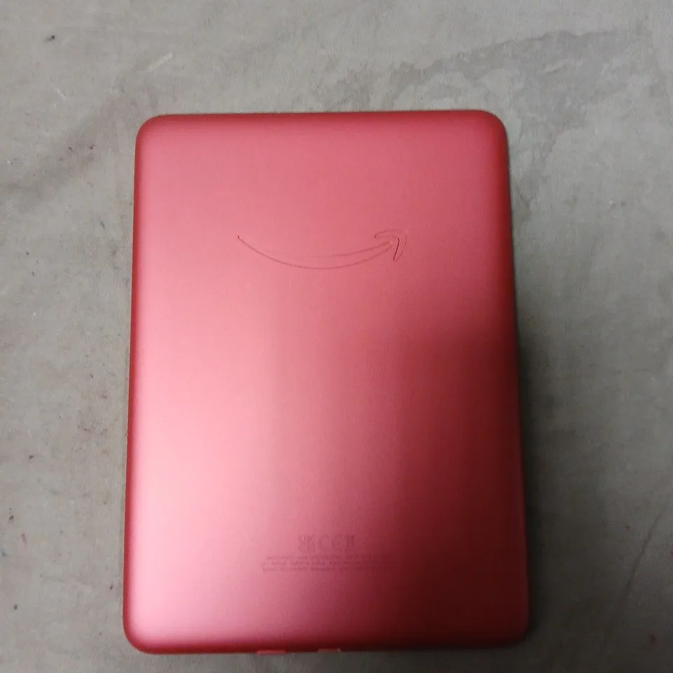 AMAZON KINDLE E-READER IN RED - MODEL UNSPECIFIED 