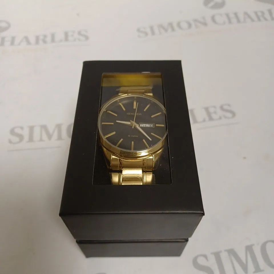 BOXED SEKONDA BLACK AND GOLD CIRCULAR WATCH 