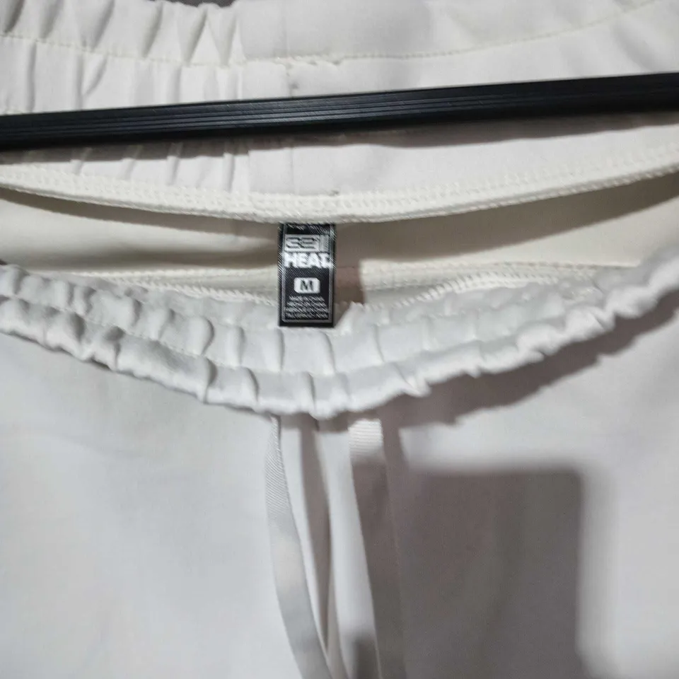 WHITE DRAWSTRING JOGGERS – 32 DEGREE HEAT – UK M